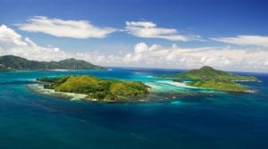 En resa till en Nationalpark med turkost vatten i Seychellerna